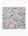 The Rachel Parker Abstract Jungle dog towel is a soft, square plush with a colorful abstract pattern—splashes of blue, pink, orange, and yellow on white. Ultra-absorbent and slightly textured for comfort.