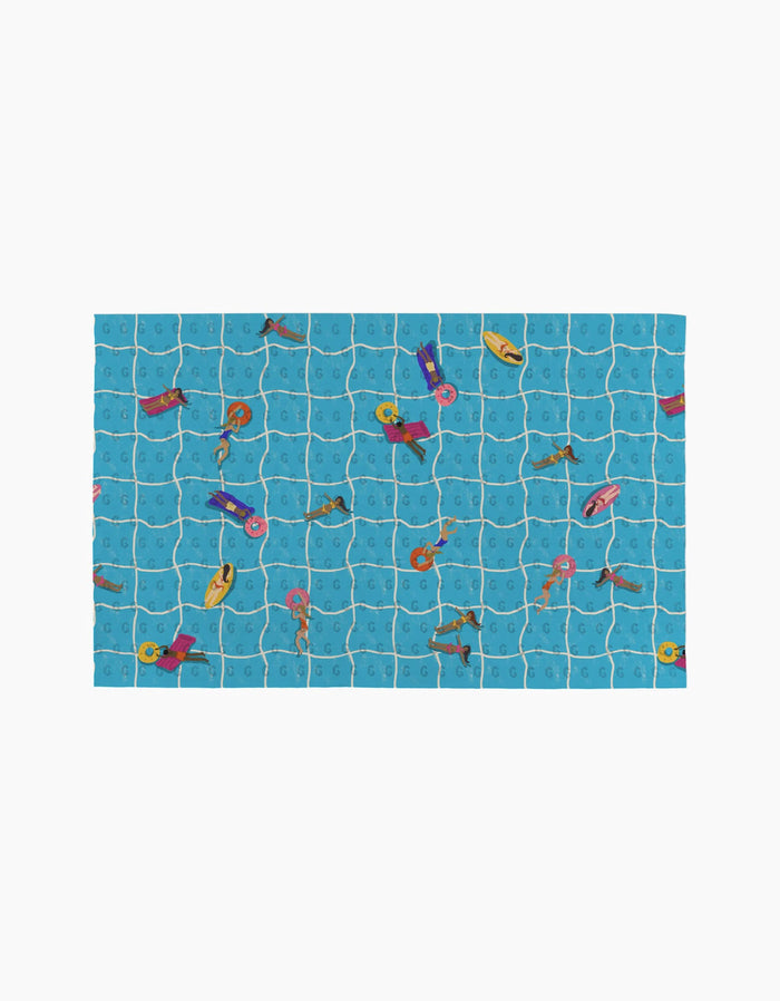 At The Pool by Geometry: An overhead illustration of a blue tiled pool with people swimming, floating on eco-friendly pool floats, and surfing.