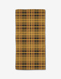The Autumn Plaid bar towel by Danelys Sidron is a rectangular, ultra-absorbent towel featuring a yellow and black plaid pattern with thin red and white lines, shown on a plain white background.