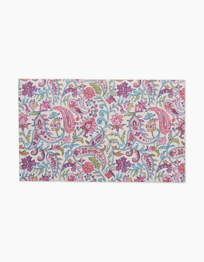 Bazaar by Maayan Alper-Swan: A rectangular textile featuring a vibrant paisley and floral pattern in pink, blue, green, and purple on white. An eco-friendly, reusable alternative to Not Paper Towels.