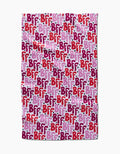 The Best Friends Forever blanket by Hufton Studio features a repeating BFF pattern in red, pink, and purple text on a light pink background with white dots, styled like a charming tea towel for cozy moments.
