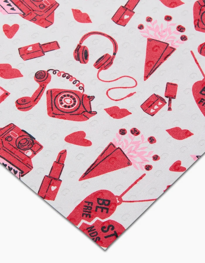 Best Friends by Charlie Rowan Designs: a white fabric with red and pink vintage phones, cameras, headphones, lipstick, hearts, and love notes—ideal for cute reusable paper towels in a playful, romantic pattern.