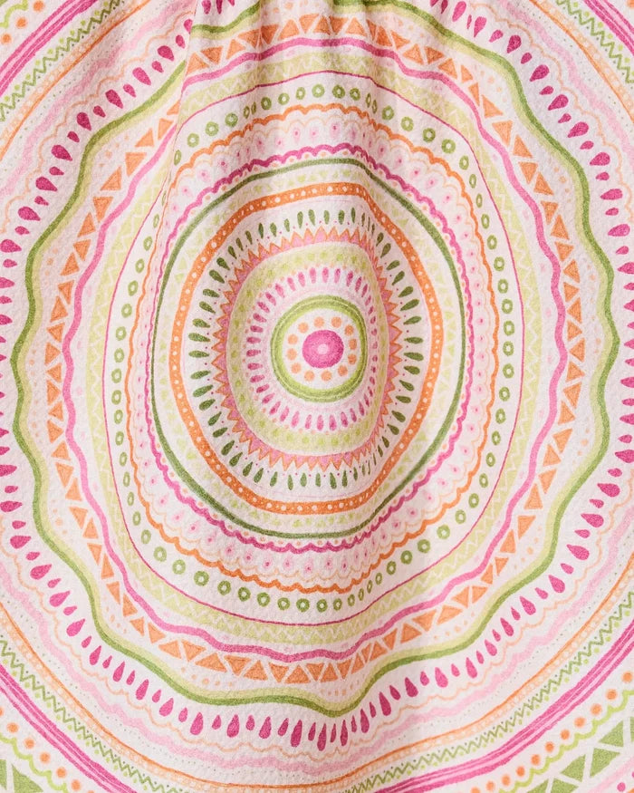 Bohemian Spring by GEOMETRY features a colorful mandala pattern with concentric circles and geometric shapes in pink, orange, green, and yellow on a quick-drying tea towel made from recycled materials.