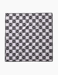 The Boneyard Black Checkerboard by Charlie Rowan Designs is a square dog towel made from recycled materials, featuring a black and white checkerboard pattern with crossed-swords emblems and a textured, eco-friendly feel.