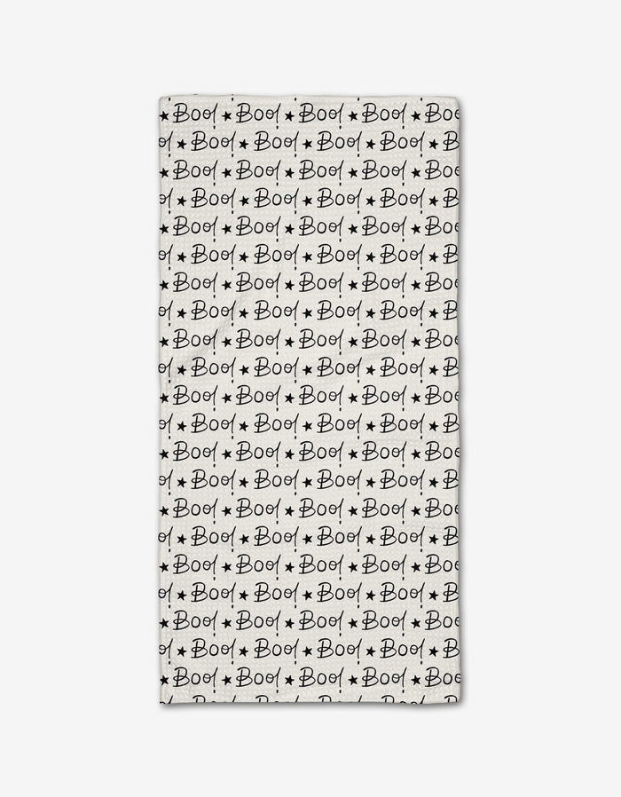 The Boo to You Bar Towel by Hufton Studio is a rectangular white towel made from recycled materials, featuring a repeating black “Boo!” text pattern with small stars for a playful, spooky Halloween design.