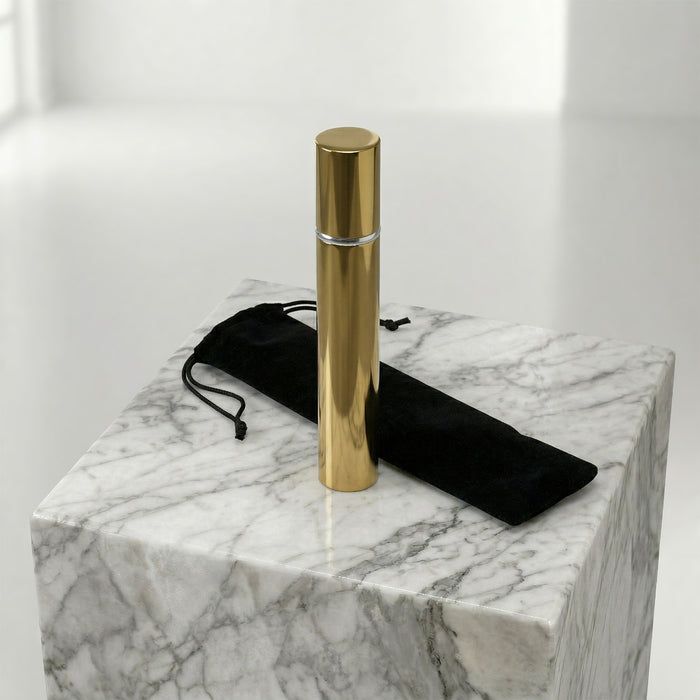 Bronze scattering tube on a marble top
