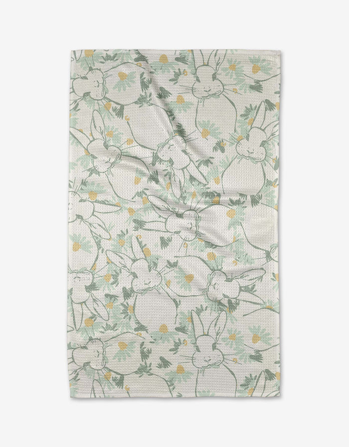Second Nature Studio’s Bunny Tea Time is a soft Geoweave tea towel featuring outlined bunnies and yellow flowers on a light background. The playful, scattered bunny pattern offers both charm and extra absorbency.