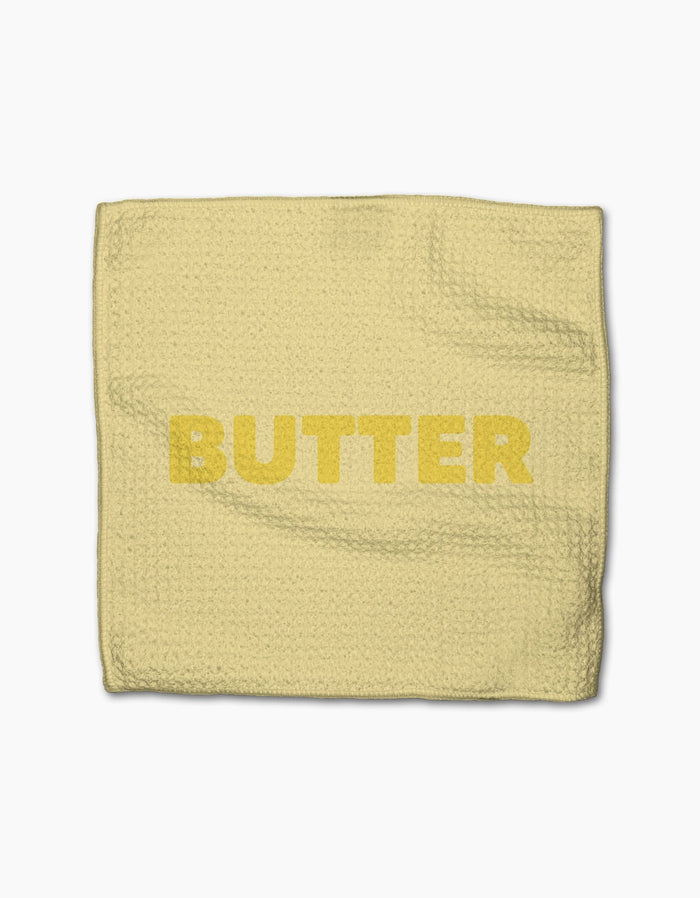 The Butter by GEOMETRY is a yellow textured Geoweave cloth with BUTTER printed in bold yellow letters across the center.