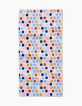 The Lizzie Clark Carnival Bar Towel features a white background with evenly spaced colorful polka dots in blue, pink, yellow, red, and orange. Made of soft Geoweave fabric for extra absorbency.