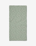 The Chamomille Terrazzo Bar Towel by Second Nature Studio is rectangular, light green Geoweave fabric with a subtle white floral pattern, shown laid flat on a white background.