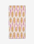The Chantenay Bar Towel by Amy MacCready is made of ultra-absorbent Geoweave fabric and features a repeating pink carrot pattern with orange leafy tops on a white background.