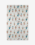 The Cheri kitchen towel by Amy MacCready features cartoon girls with hearts and potted plants in blue, red, and brown accents on textured white fabric—a cheerful addition to your kitchen décor.