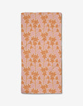 The Cherry Blossom Branches bar towel by Lizzie Clark features a rectangular pink design with an orange floral pattern, made from Geoweave fabric and recycled materials, shown on a white background.