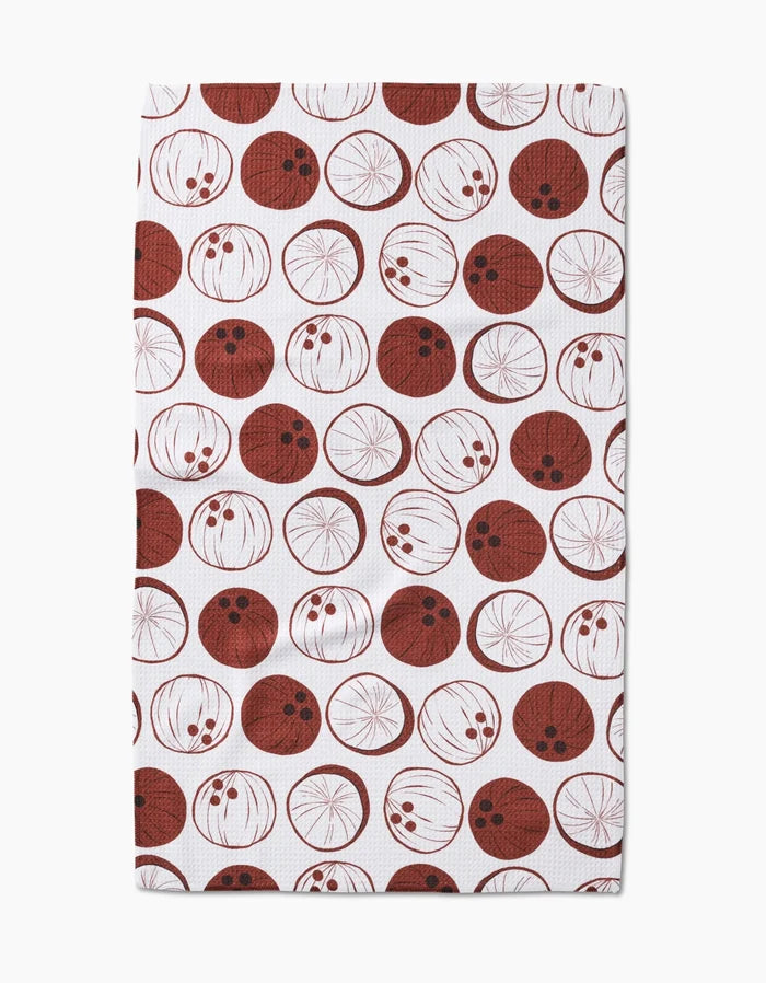 The Sara Mari Coconutz About You kitchen towel features ultra-absorbent Geoweave fabric and a red and white pattern of circles with playful line drawings resembling abstract fruit or vegetable slices.