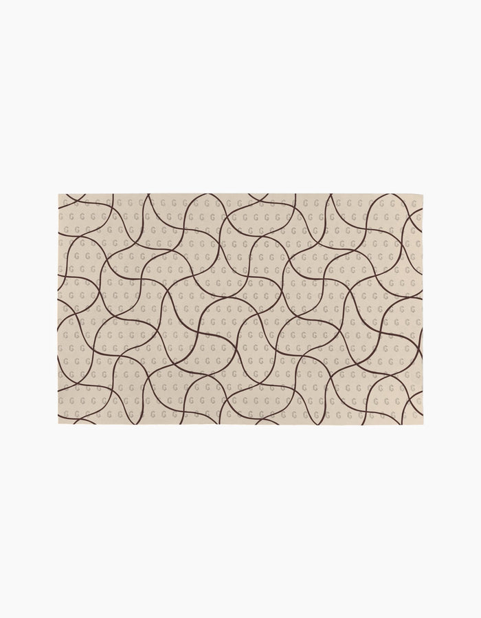 Coffee Reverie by Gerdadzy features a beige rectangular surface with curved brown lines and dotted semicircles, adding an abstract, geometric style to these eco-friendly paper towels.