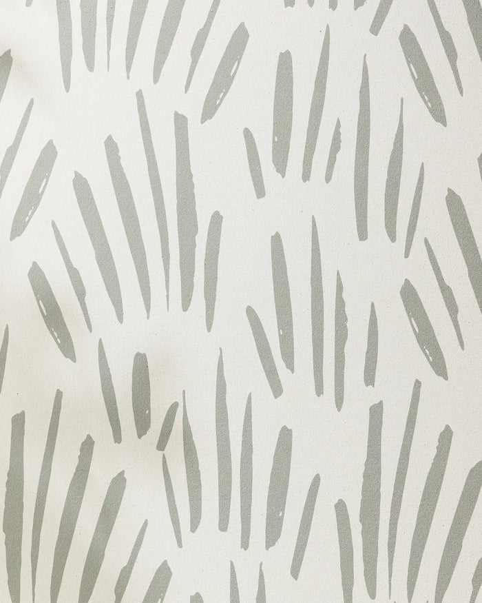 Country Fields by Hufton Studio features clusters of irregular, vertical gray brushstrokes on an off-white background—this minimalist, organic pattern adds movement and style to a non-slip yoga towel that enhances your practice.