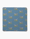The Geometry Dalmatian In Boots Blue blanket features a pattern of black-and-white dogs in yellow boots, crafted from ultra-absorbent recycled materials.