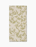 The Geometry Dotted Floral Garden napkin features ultra-absorbent Geoweave fabric with a stylish green and white floral pattern on a light background, perfect for enhancing any table setting.