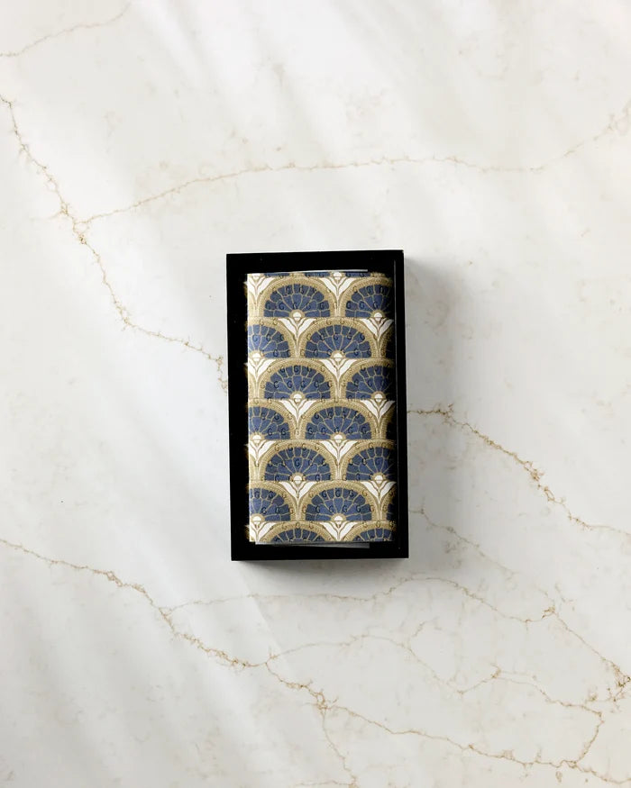 Eliza by Amy MacCready is a rectangular box with a blue and gold art deco fan pattern, crafted from post-consumer recycled materials—an eco-friendly choice for your space. Displayed on light marble with brown veining.