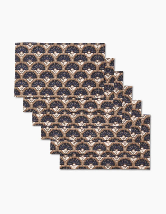 Six Eliza rectangular placemats by Amy MacCready, featuring an art deco fan print in navy, gold, and white, offer a stylish and eco-friendly alternative to paper towels for elegant, sustainable dining.