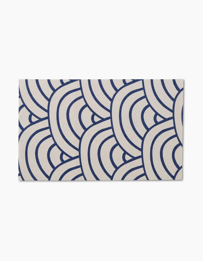 Every Wish by GEOMETRY is a reusable rectangular card featuring a navy blue overlapping scale pattern on cream—an eco-friendly alternative to paper towels.