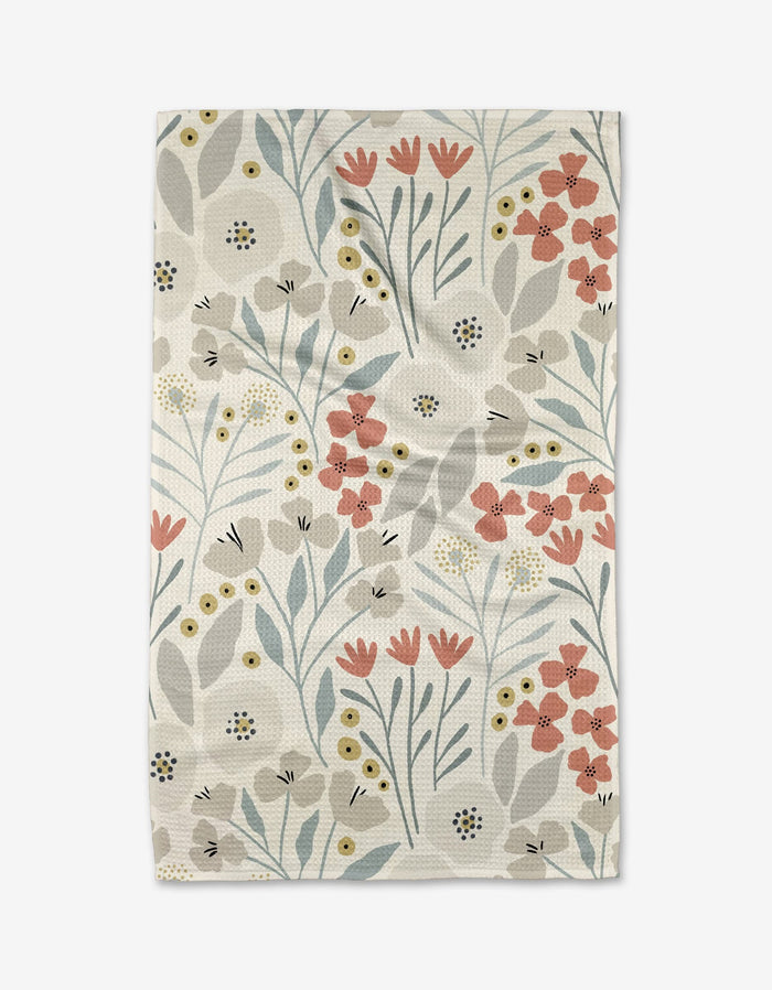 The Fiona Cream Tea Towel by Amy MacCready is made from Geoweave™ fabric and showcases pink, red, yellow, and blue flowers with green leaves on a white background for a charming kitchen accent.