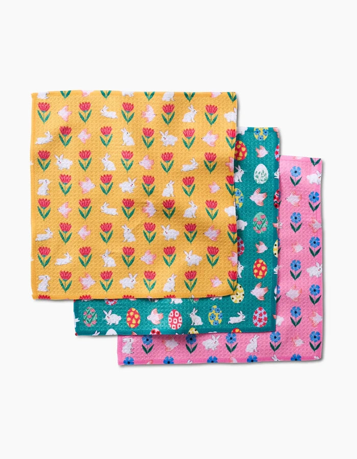 Add a burst of color to your kitchen with Ceyda Alasars Floral Easter Parade dishcloth set—three vibrant cloths featuring yellow tulips and bunnies, teal Easter eggs and bunnies, and pink with blue flowers.