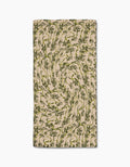 The Geometry Floral Swirls Green bar towel features swirling green floral patterns on beige Geoweave fabric, creating a dynamic look. The rectangular towel is shown lying flat on a white background.