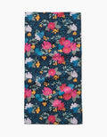 The Flower Bouquets Bar Towel by Katie OShea features vibrant pink, red, yellow, white, and orange flowers with green leaves on a dark background, crafted from durable Geoweave fabric.