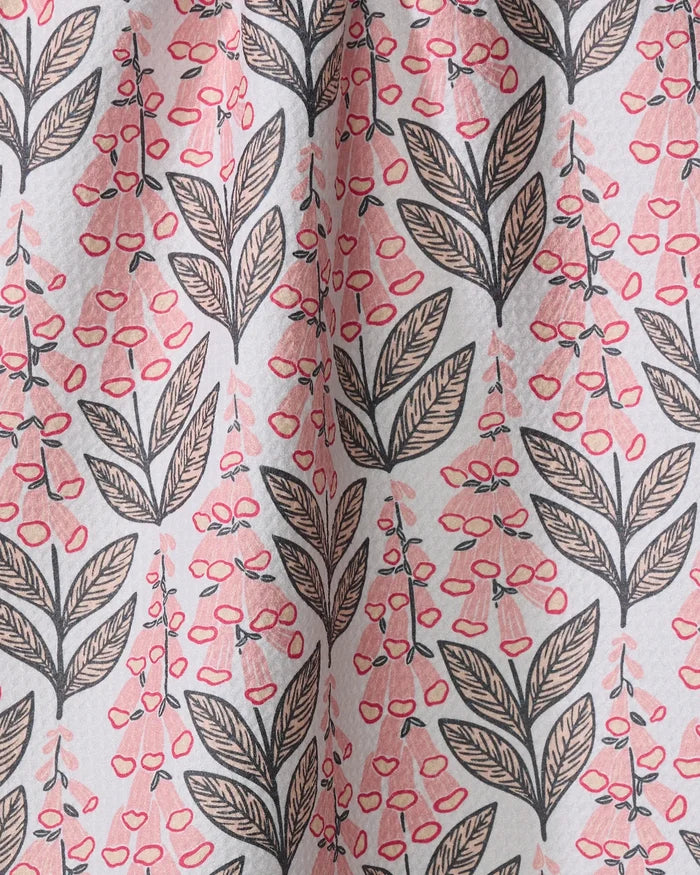 Foxglove Finery by Sarah Daugherty features black outlined leaves, light brown accents, and pink berry-like clusters on a light background—ideal for an eco-friendly kitchen towel.