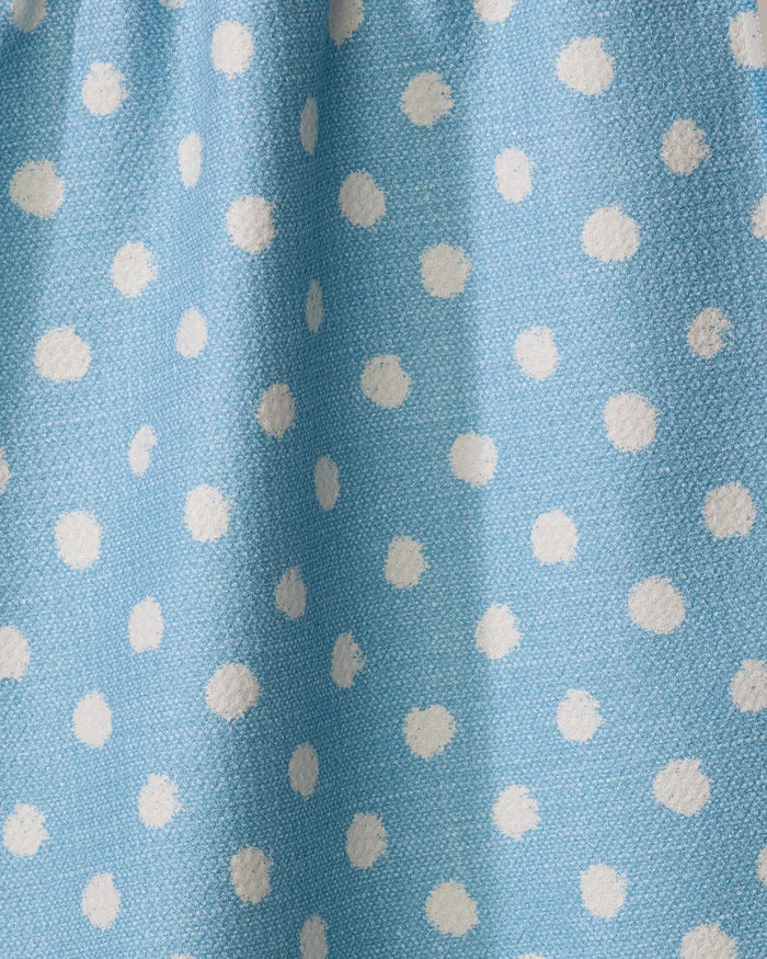 The Freckle Light Blue tea towel by Geometry features a visible texture and evenly spaced white polka dots, crafted from recycled materials.