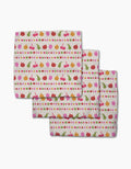 Geometry’s “Fruits At The Party” set includes three Geoweave napkins featuring cherries, apples, pears, and dots in colorful horizontal stripes on a light background.