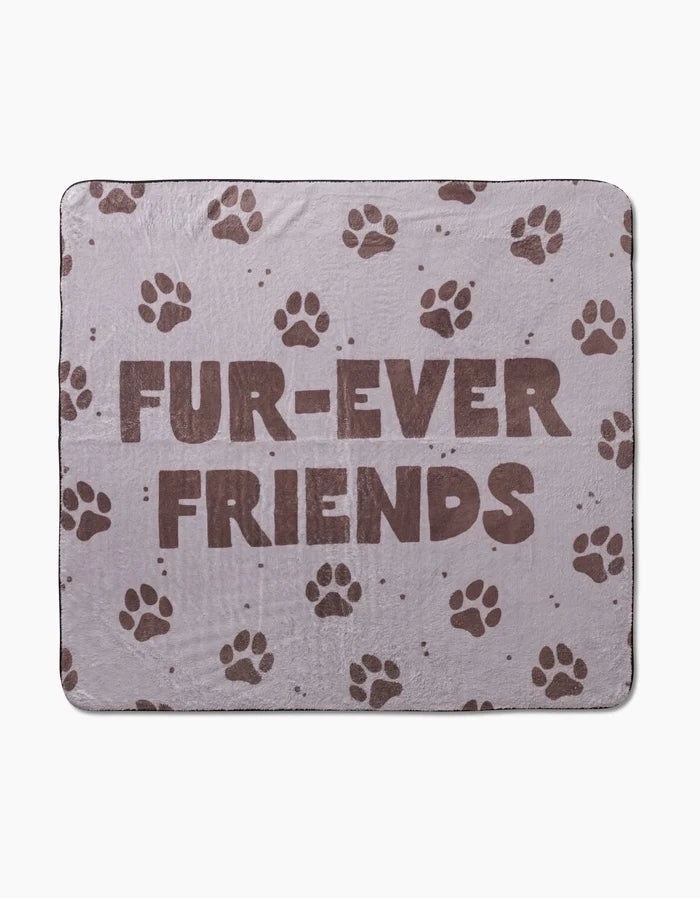 The Geometry Fur Ever Friends Plush Dog Towel is light brown with dark brown paw prints and FUR-EVER FRIENDS in bold. Made from ultra-absorbent recycled materials, it offers comfort and sustainability.