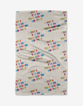 The Good Question blanket by Quotes by Christie features Geoweave beige fabric with WHATS THE BEST THAT COULD HAPPEN? printed repeatedly in vibrant, playful lettering.