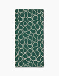 The Gerdadzy Green Loops napkin is a dark green rectangular cloth made from recycled materials, featuring a white wavy interconnected line pattern across its surface, shown on a white background.