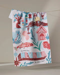 The Geometry Greetings From Nevada tea towel features colorful Nevada symbols—cactus, lizard, playing cards, gems, mountains, and bold “Greetings from NEVADA The Silver State”—and adds quick-drying charm to any kitchen.