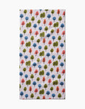 The Kayla Ann Happy Trees Bar Towel features a repeating pattern of small, stylized blue, green, and orange trees on white Geoweave fabric.
