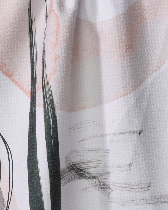 Close-up of Harper Abstract by Kailee Wright, showing textured fabric with soft pink and black brush strokes and curved lines on white—perfect for a stylish recycled kitchen or absorbent tea towel.