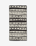 The Danelys Sidron Heartstring Bar Towel features black and white horizontal stripes with hearts, dots, and lines on a white background, crafted from ultra-absorbent Geoweave fabric.