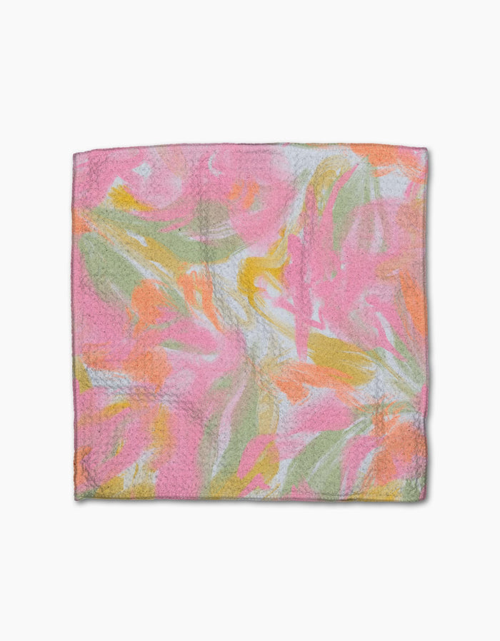 The Geometry Heat Wave square dishtowel features Geoweave fabric and a vibrant, abstract floral design in pink, orange, green, and yellow—perfect for adding style and super-absorbency to your dishcloth set.