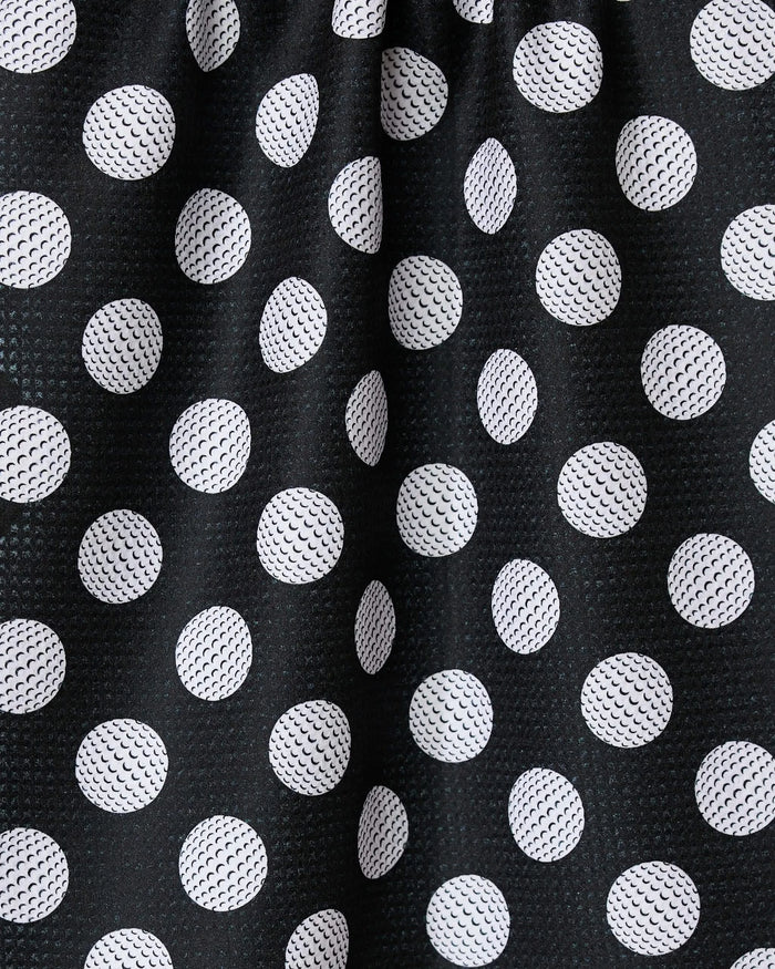 The GEOMETRY Hole In One towel showcases black fabric with white polka dots, visible texture, and subtle folds. Ultra-absorbent and stylish, it’s a practical addition to any kitchen.