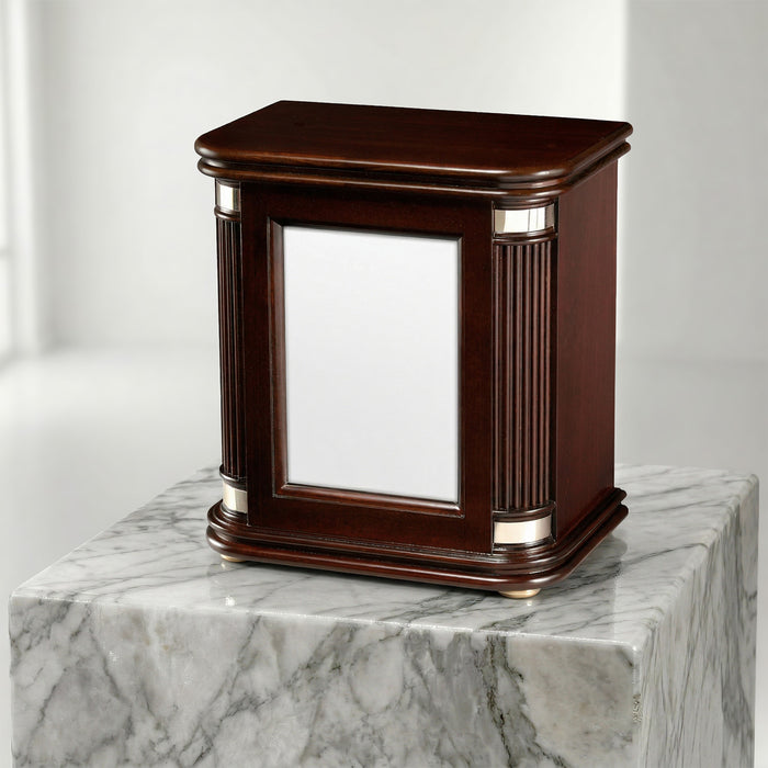 Wooden urn on a marble surface with a white background