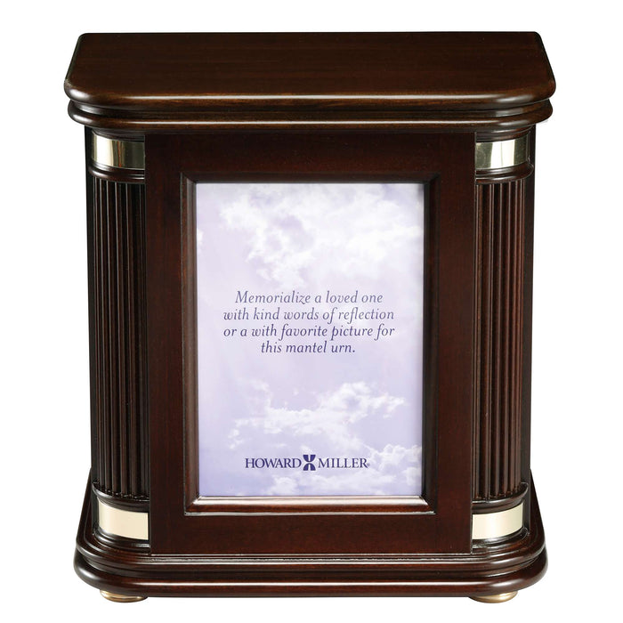 Wooden memorial urn with a photo frame and a reflective inscription.