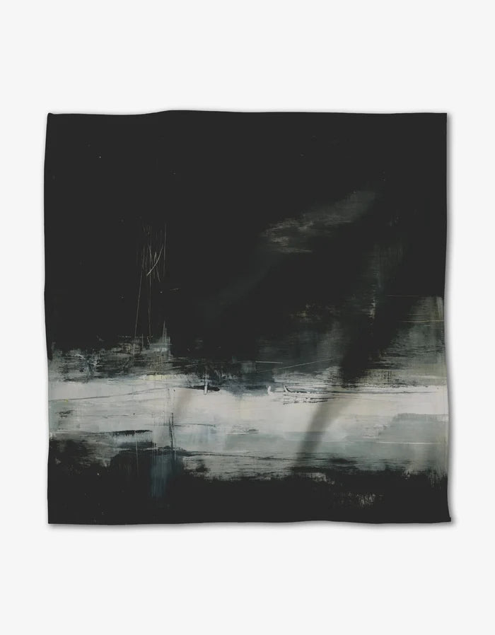 Icelandic Elements by Jennifer Janesko showcases dark blacks and deep greens with a misty white-gray band—evoking depth and movement, perfect for Geosuede Dinner Napkins made from post-consumer recycled materials.
