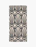 The Amy MacCready Jocelyn bar towel is beige, rectangular, made from Geoweave fabric, and features a bold black geometric pattern of stylized fan shapes or arches.