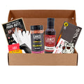 Box containing Lanes BBQ products including seasoning packets, bottles, and a knife.