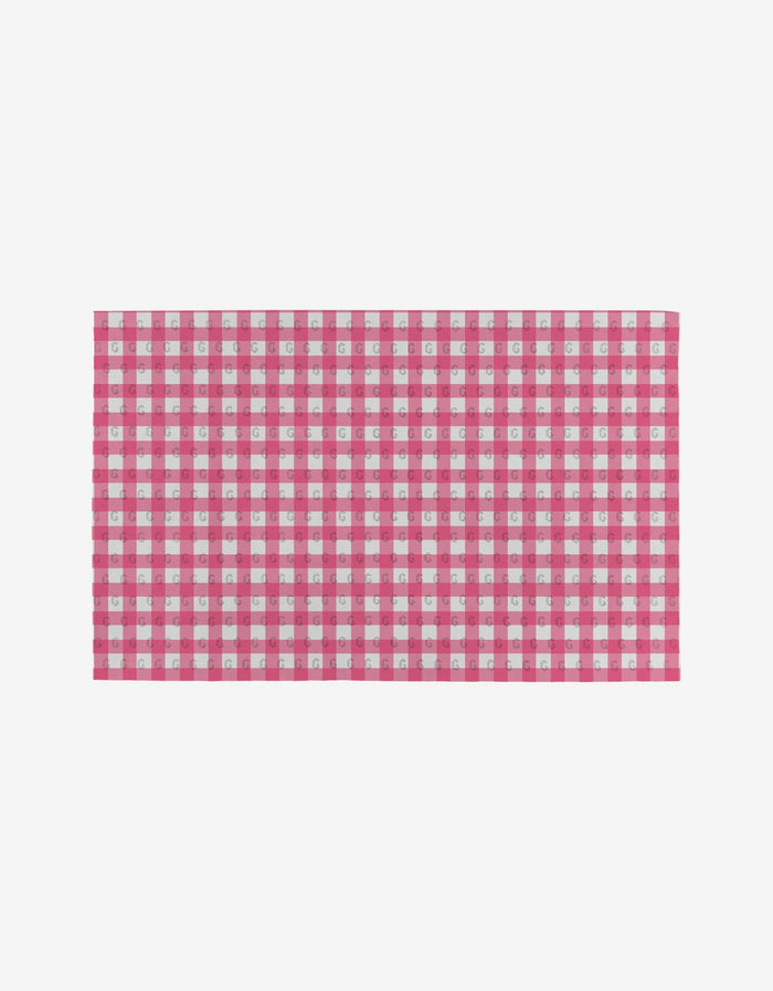 The Lemon Pop mat by Ashley Celena features a red and white checkered pattern, offering an eco-friendly and reusable alternative to disposable paper towels, perfect for your home and centered on a clean white background.