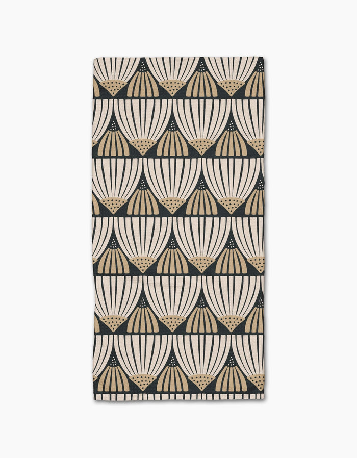 The Letitia Bar Towel by Amy MacCready features a repeating beige and black fan-shaped geometric pattern on a white background, crafted from durable Geoweave fabric.