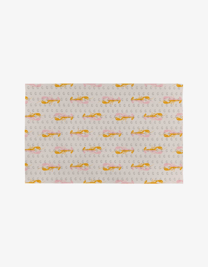 Rectangular fabric by GEOMETRY, Lobster Love: features a repeating pattern of red lobsters with small gray G letters and pink accents on a light background. Made from eco-friendly, post-consumer recycled materials—perfect as Not Paper Towels.