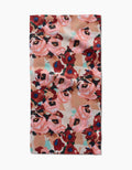 The Lucia towel by Ania Zwara Art is rectangular and ultra-absorbent, featuring overlapping red, pink, and peach roses with teal and blue highlights on a beige background.